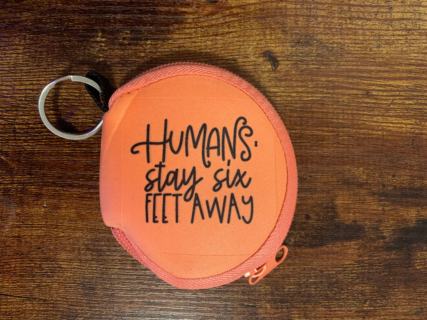 Coral Mask holding Keychain