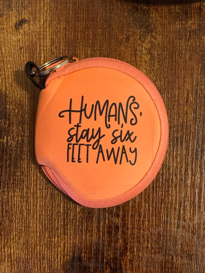 Coral Mask holding Keychain