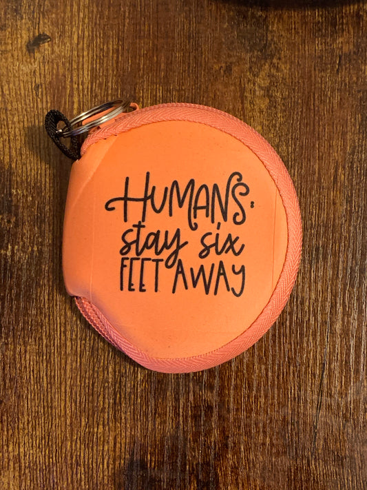 Coral Mask holding Keychain